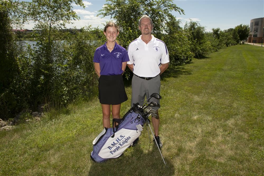 Student Golfer Sarah Ramsden posing for a picture with her gold coach